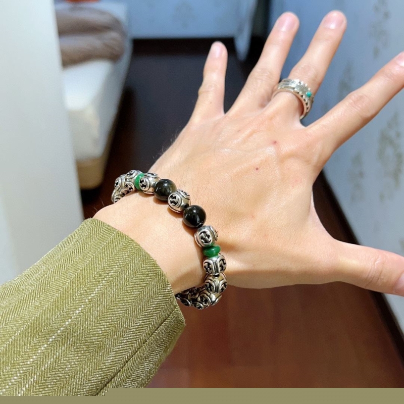 G*u*i bracelets